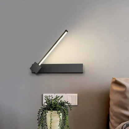 Modern black finish rotatable led wall sconce with matte black finish and adjustable arm for bedroom lighting