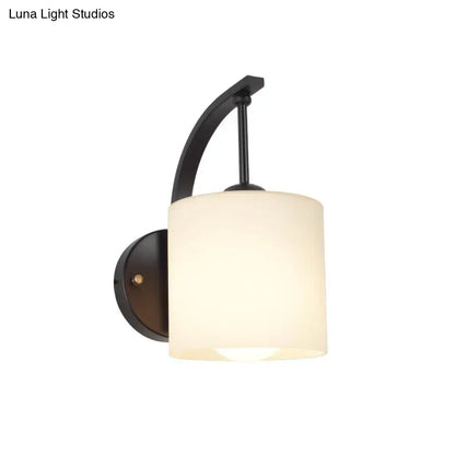 Modern black finish wall lamp with a frosted off-white cylindrical glass shade suitable for 220v-240v 110v-120v use