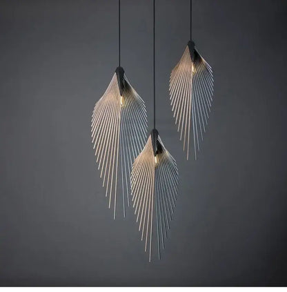 Modern black flying wing shape metallic pendant lights with sleek feather design and warm glowing bulbs for living room
