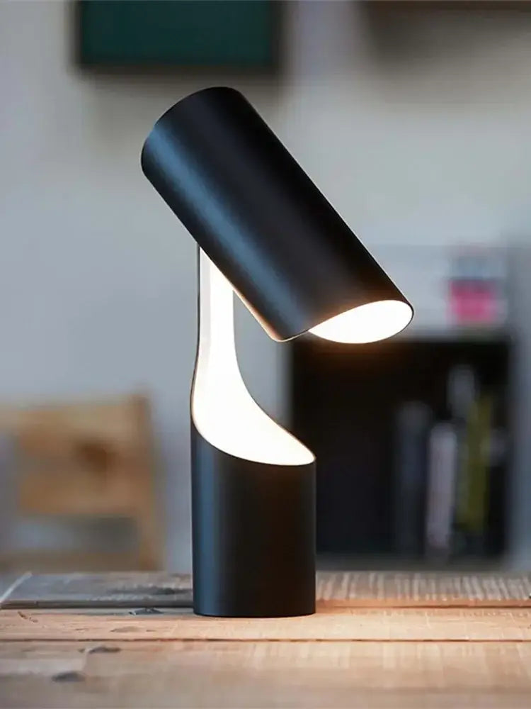Modern black foldable desk lamp with sleek cylindrical design and warm light for study and bedroom by decorbites black foldable