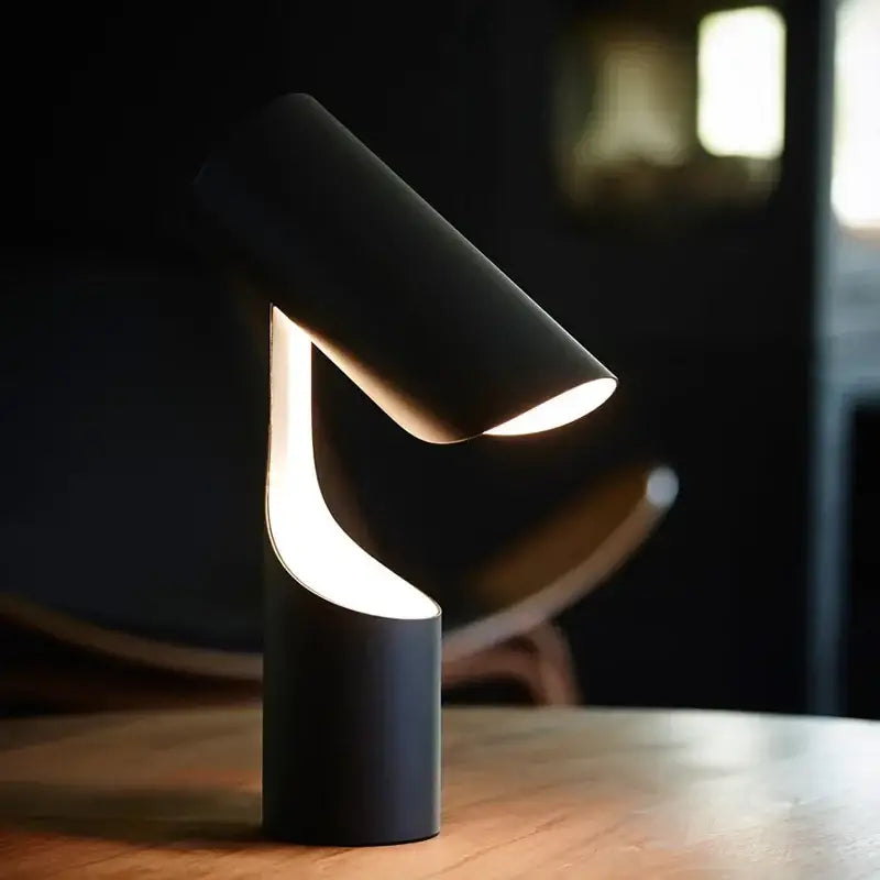 Modern black foldable desk lamp with sleek cylindrical design and warm light for study and bedroom decorbites black foldable