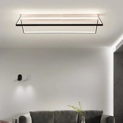 Modern black geometric led ceiling light with sleek frame and white led strip for living room illumination decorbites geometric led