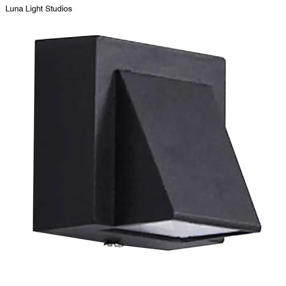 Modern black geometric led outdoor wall mount with matte finish and rectangular design for patio lighting