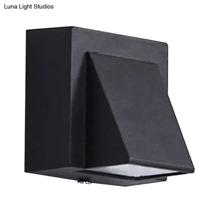 Modern black geometric led outdoor wall mount with matte finish and rectangular design for patio lighting