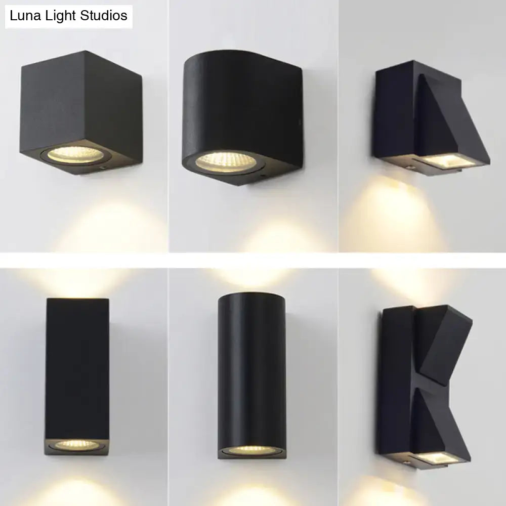 Modern black geometric led outdoor wall mount featuring sleek design with warm focused lighting for outdoor wall use
