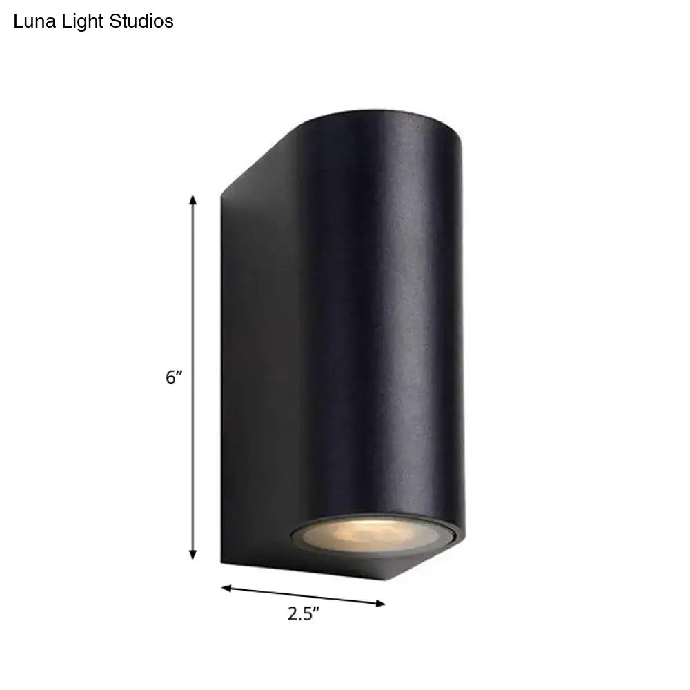 Modern black cylindrical matte outdoor wall mount with warm led light for geometric led outdoor wall decor