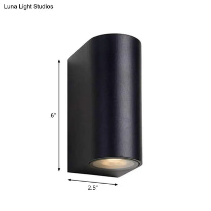 Modern black cylindrical matte outdoor wall mount with warm led light for geometric led outdoor wall decor