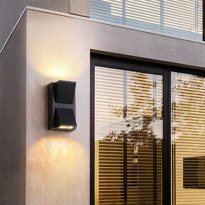 Modern black geometric led wall lamp with angular design for garden outdoor decorbites led wall sconce