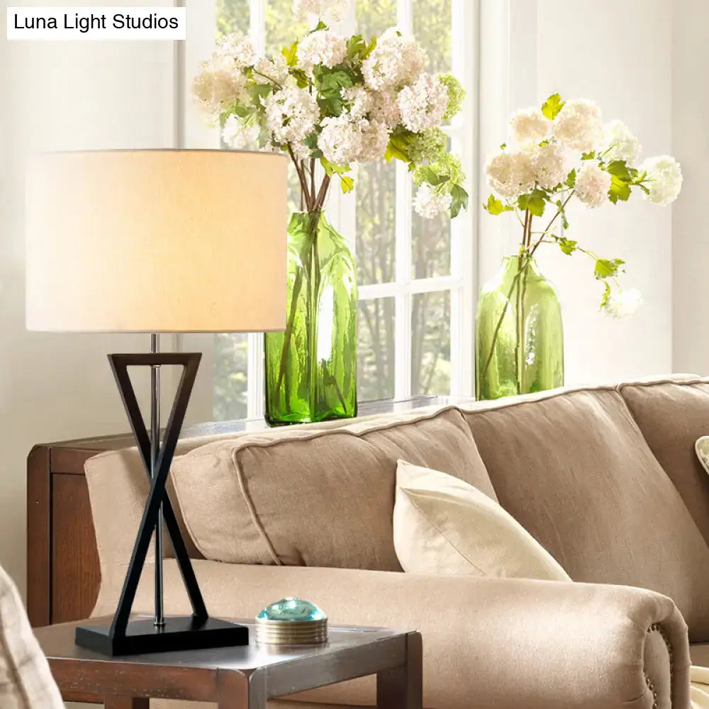 Black geometric drum nightstand lamp with cream fabric shade by DecorBites 1-light 15-inch fixture bedside table light
