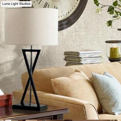 Black metal drum nightstand lamp with white fabric drum shade 1-light bedside table inch fixture by decorbites