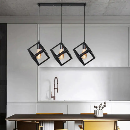 Modern black geometric pendant light featuring three exposed filament bulbs for kitchen island decorbites black geometric design
