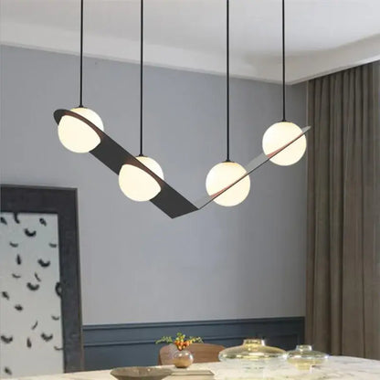 Modern black glass ball geometric chandelier with four glowing spherical bulbs and a sleek angular metal frame decorbites glass ball