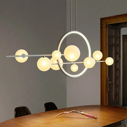 Modern black glass ball led chandelier featuring a sleek white metal frame with asymmetrical glowing glass ball led bulbs for dining room decorbites glass ball lighting