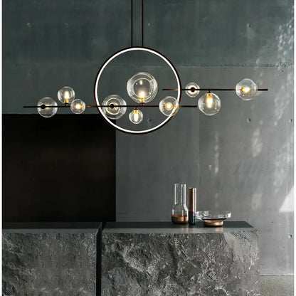 Modern black metal decorbites glass ball led chandelier with clear globe bulbs arranged circularly for dining room lighting