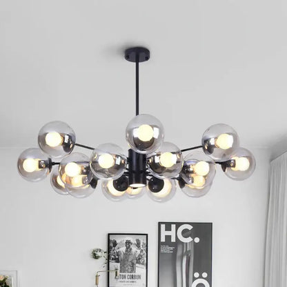 Modern black metal ball led chandelier with clear glass globe bulbs ideal for dining room decorbites glass ball lighting