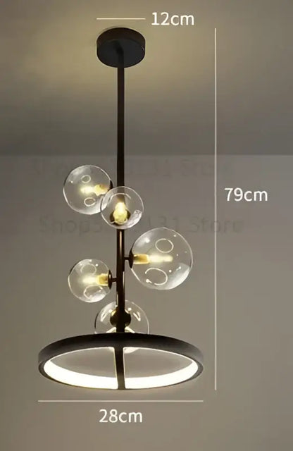 Modern black metal chandelier featuring clear decorbites glass ball led bulbs and a circular led ring base for living room decor