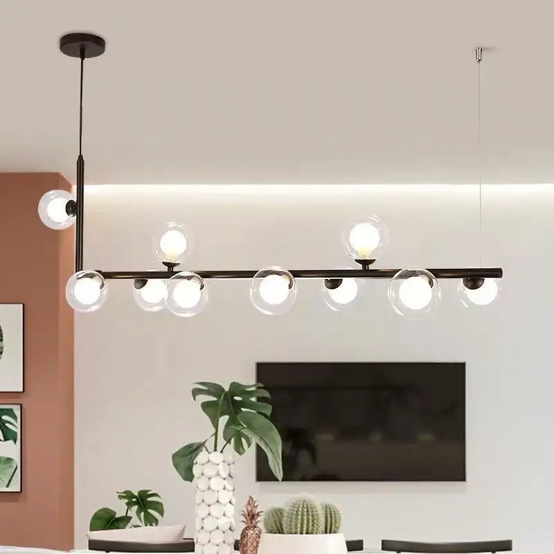 Modern black glass ball led chandelier with brass finish, clear glass globe bulbs, and circular led ring for living room decorbites glass ball