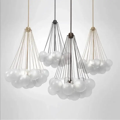 Modern black glass ball led chandelier featuring cloud-shaped frosted glass spheres with brass and black metal frames decorbites glass ball