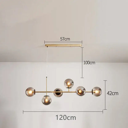 Modern black glass ball pendant lamps featuring a brass chandelier with five smoked glass globe bulbs in linear design decorbites glass ball