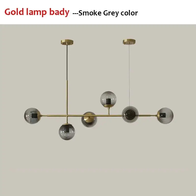 Modern chandelier pendant light with gold-toned bar and five smoke gray glass spheres decorbites glass ball design