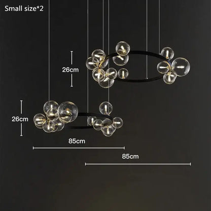 Modern black glass bubble chandelier with clear globe bulbs and gold accents for dining room decorbites glass bubble