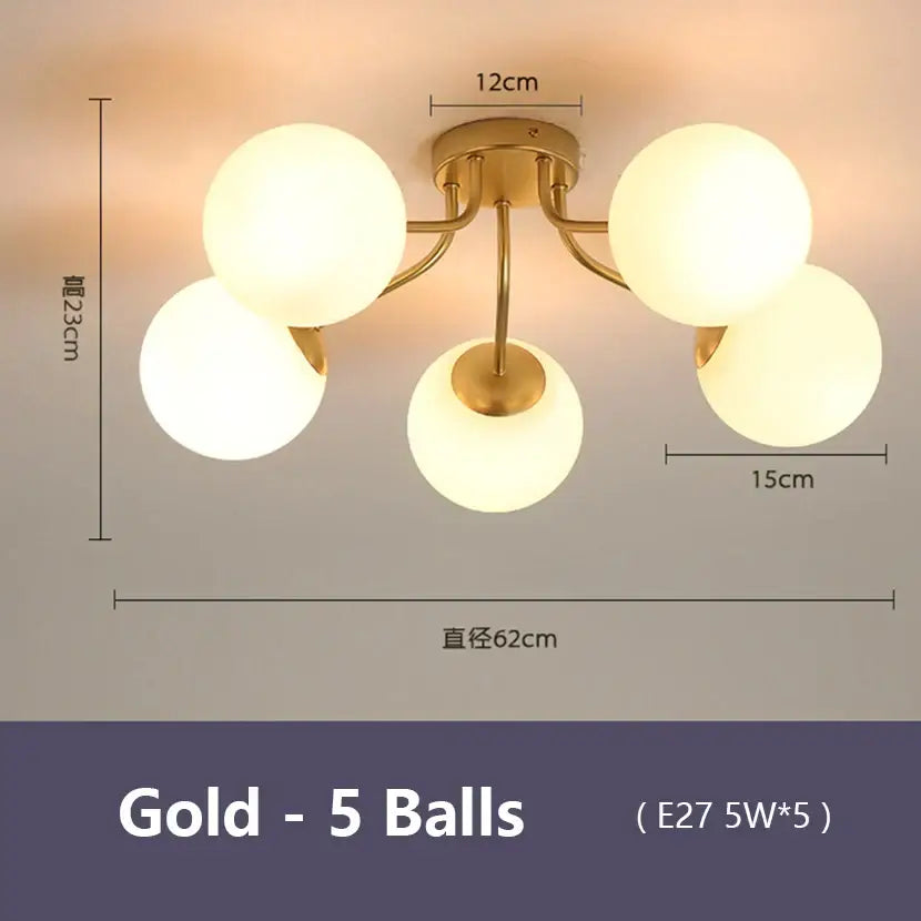 Modern gold ceiling light with five frosted glass globe bulbs featuring decorbites glass bubble led design for living room