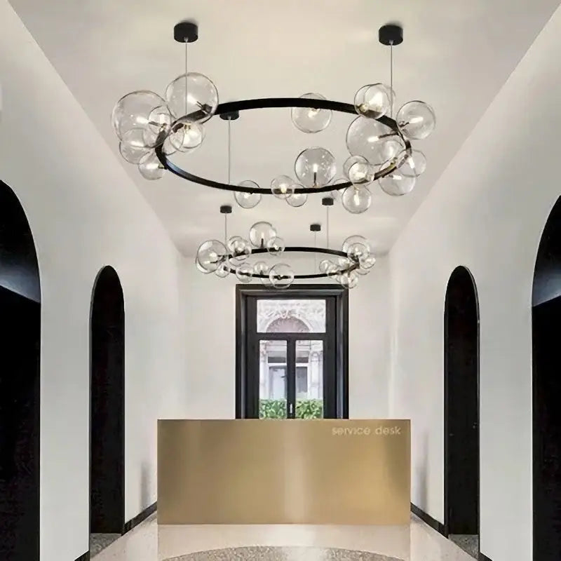 Modern black glass ring pendant light with clear glass globe bulbs for stylish dining room decorbites black glass chandelier
