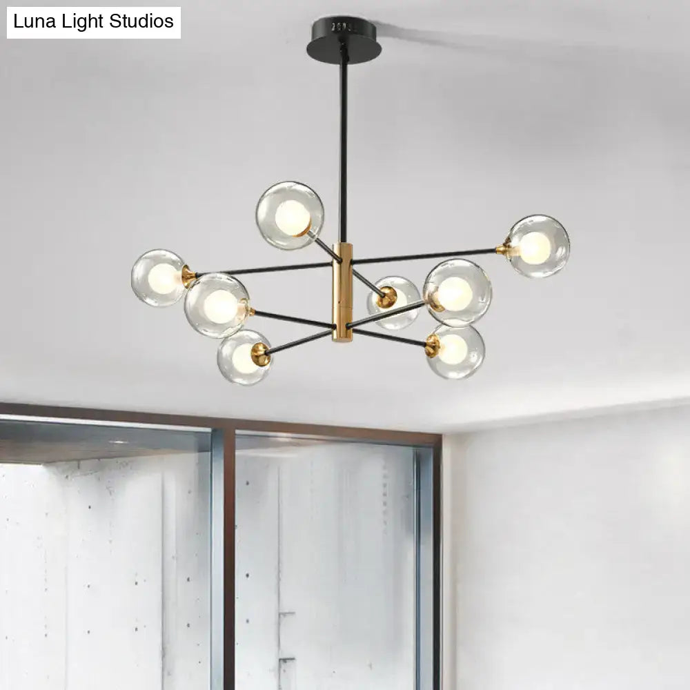 DecorBites modern black and gold 8-light pendant chandelier with clear glass globe bulbs and brass accents fixture width