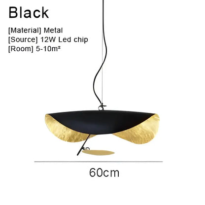 Modern black and gold pendant lamp with gold leaf accents and sculptural design for dining room decorbites lederam manta pendant