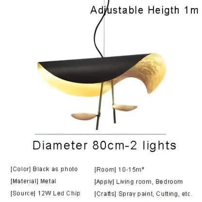 Modern black and gold abstract pendant light with sculptural metal design for dining room by decorbites lederam manta