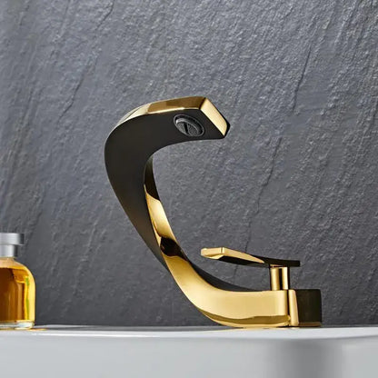 Modern black and gold basin faucet with sleek curved design and polished metallic finish by decorbites black