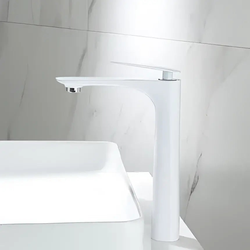 Modern black and gold basin faucet with tall cylindrical body and sleek white minimalist design by decorbites black