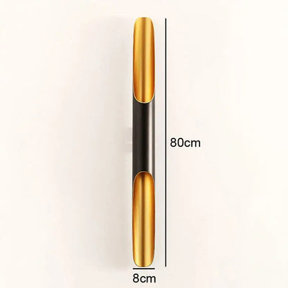 Modern black and gold blade pendant light with sleek metallic finish and polished golden sections by decorbites coltrane pendant