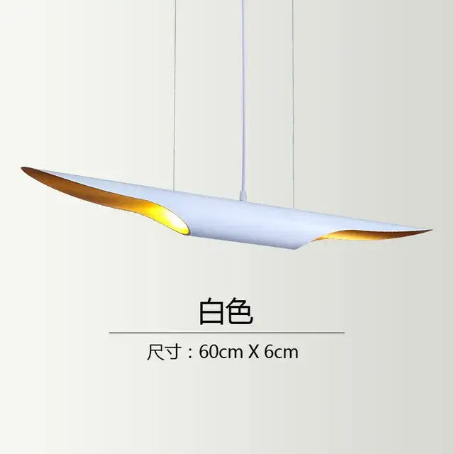 A sleek white decorbites coltrane pendant light with gold accents and modern oval design for dining room decor