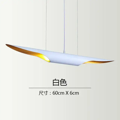 A sleek white decorbites coltrane pendant light with gold accents and modern oval design for dining room decor