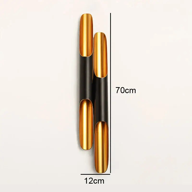 Modern black and gold blade pendant light with sleek metallic finish featuring two vertical cylinders 70cm tall by 12cm wide decorbites coltrane pendant light