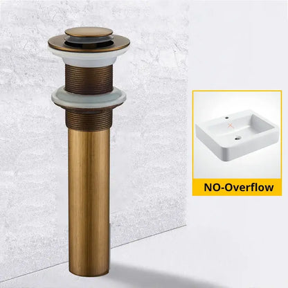 Modern black and gold brass basin sink pop up drain with fluted cylindrical body and ridged top cap decorbites brass basin