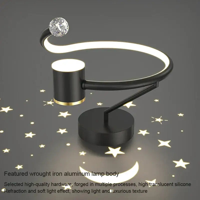 Modern black and gold celestial led ceiling lamp with black wrought iron aluminum frame and glowing curved light strip decorbites led ceiling