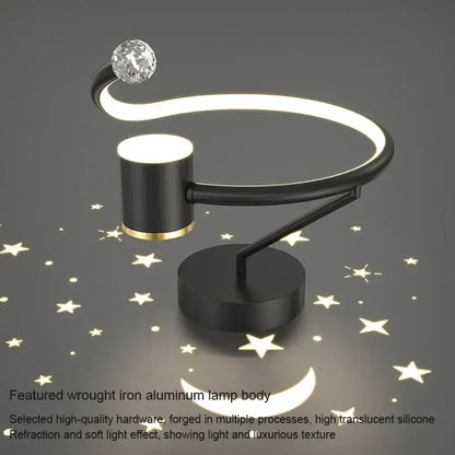 Modern black and gold celestial led ceiling lamp with black wrought iron aluminum frame and glowing curved light strip decorbites led ceiling