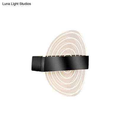 Modern black and gold wall lamp with concentric circular led light patterns ideal choice for living room modern wall decor