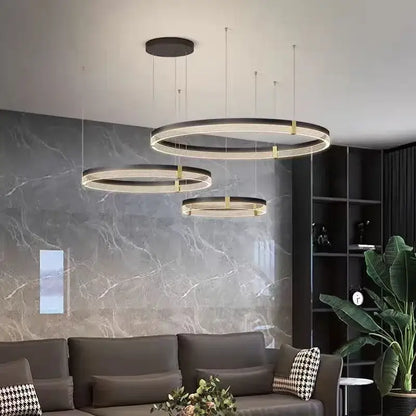 Modern black and gold circular pendant light with decorbites black acrylic led rings for living room illumination