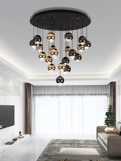 Modern black and gold crystal ball pendant light with spherical design and circular ceiling mount for living room decorbites pendant light