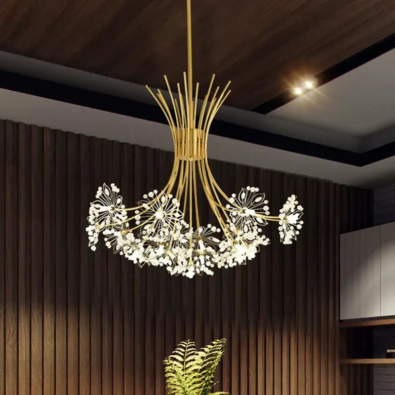 Modern black and gold decorbites crystal bouquet pendant light with gold dandelion floral design and white crystal accents