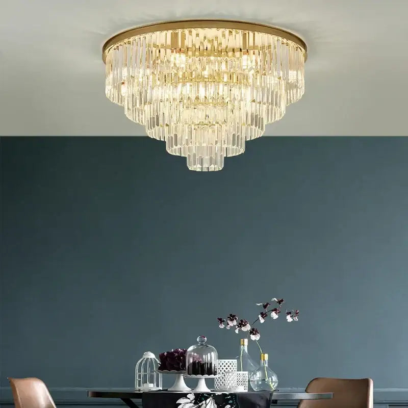 Modern black and gold crystal ceiling chandelier with multi-tiered clear glass prisms for living room lighting