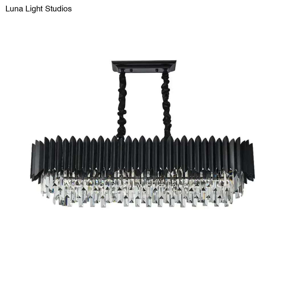 Modern black and gold rectangular chandelier with faceted crystal droplets and twisted black metal chains for dining room use