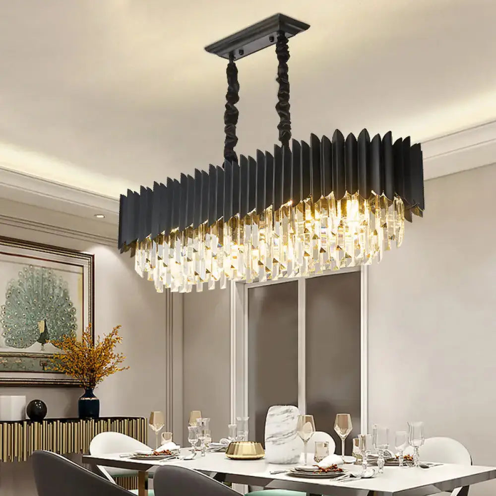Modern black and gold rectangular chandelier with faceted crystal droplets for dining room lighting