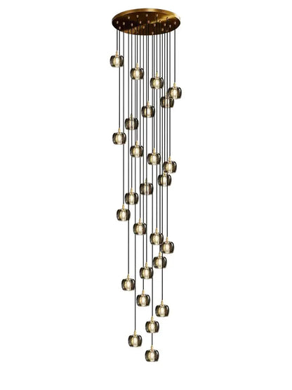 A modern black and gold crystal chandelier led pendant light with brass finish and cascading glass globes for staircases