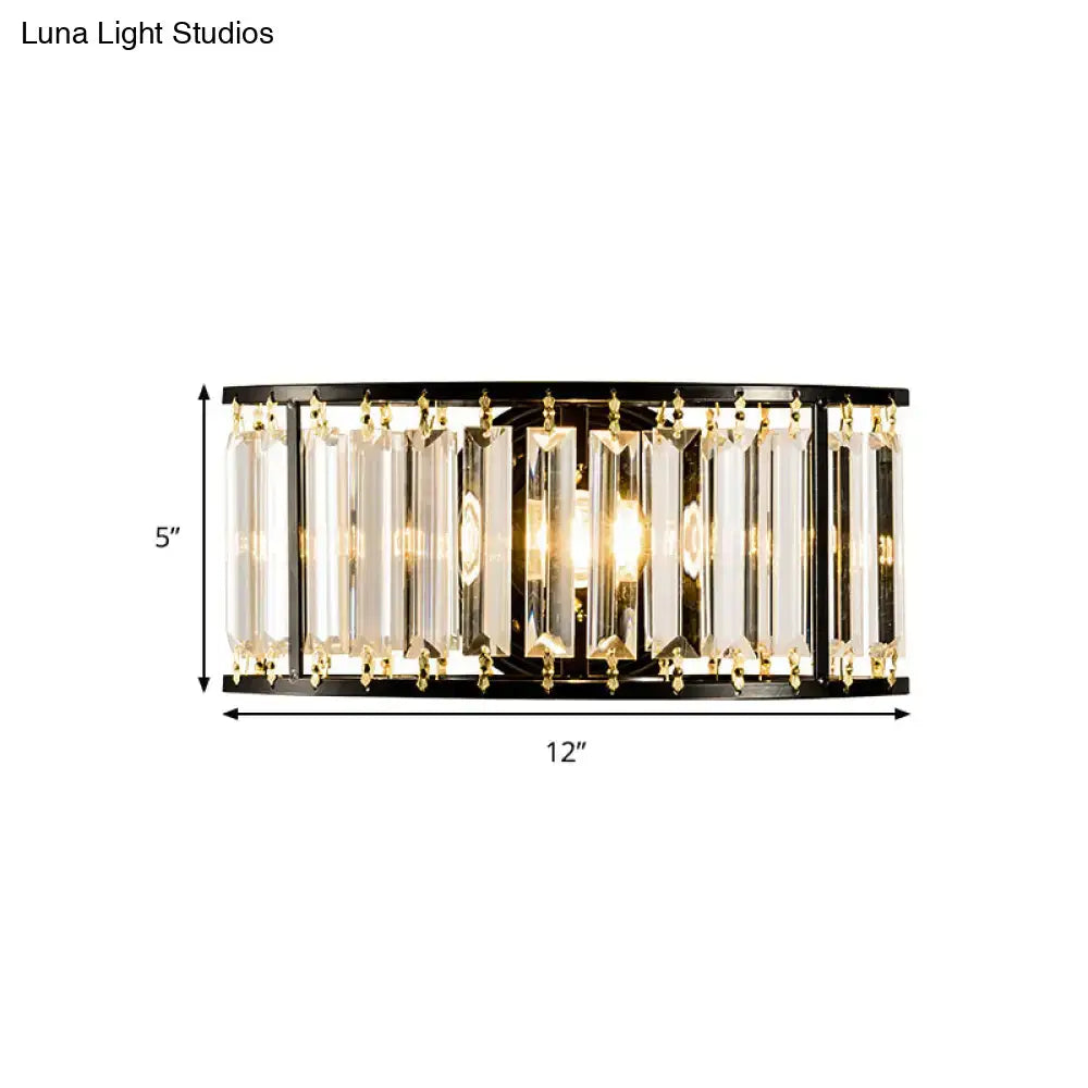Modern black and gold crystal half cylinder wall sconce with clear crystal half prisms for bedroom lighting using led or incandescent bulbs