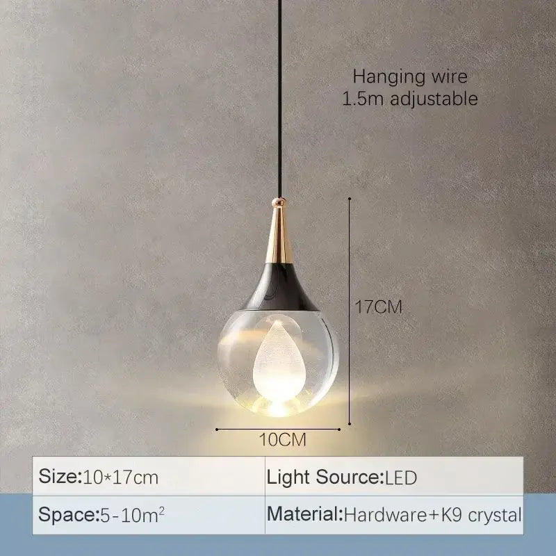 A modern black and gold crystal led ball pendant with clear glass globe for dining room decorbites crystal led lighting