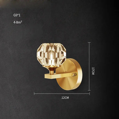 Modern black and gold crystal led wall sconce with gold finish and faceted crystal globe for bedroom lighting decorbites crystal led